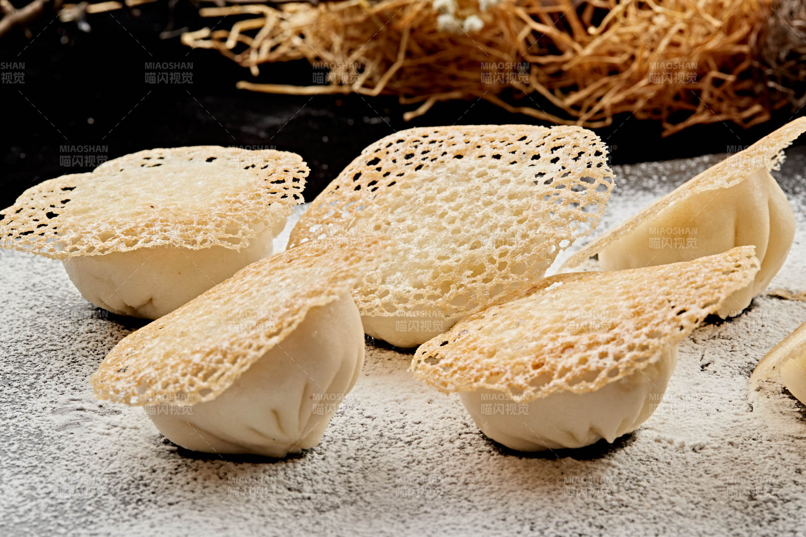 雪花渔网水煎包图片