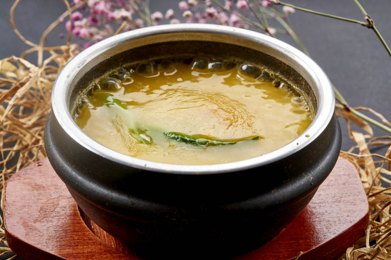 香浓小米蟹黄粥炖海参图片