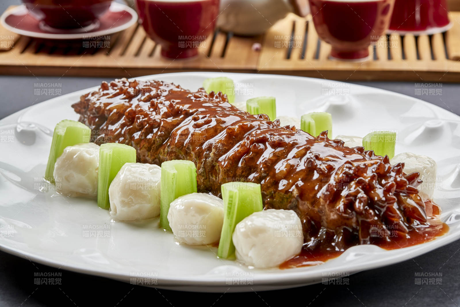 红烧寿桃梅花参配手打墨鱼丸图片