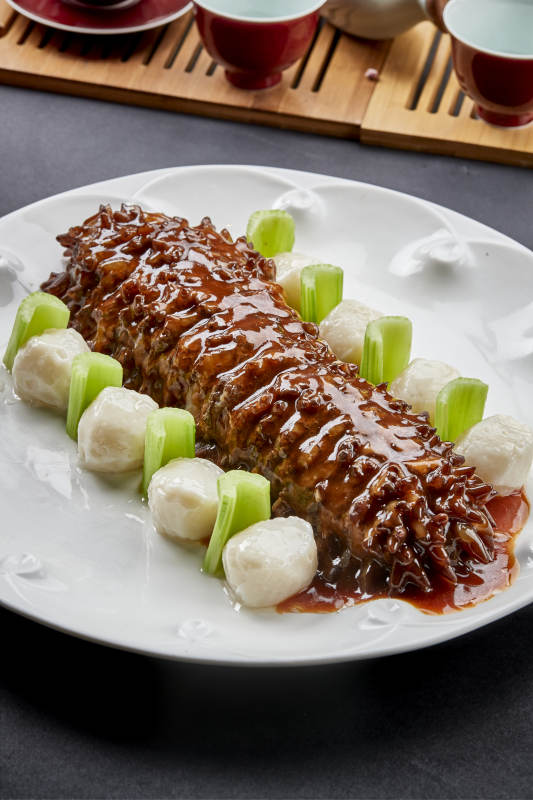 红烧寿桃梅花参配手打墨鱼丸图片