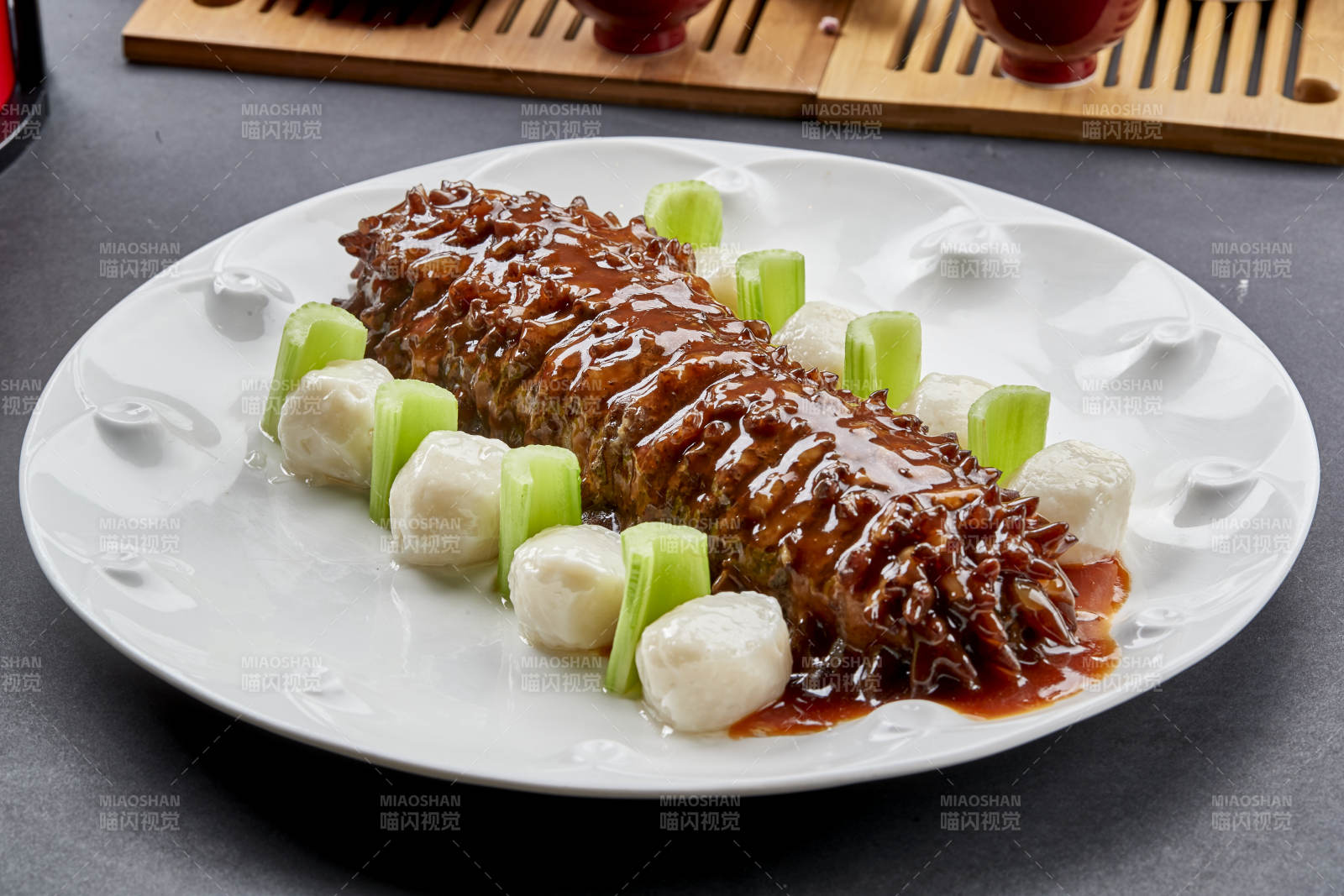 红烧寿桃梅花参配手打墨鱼丸图片