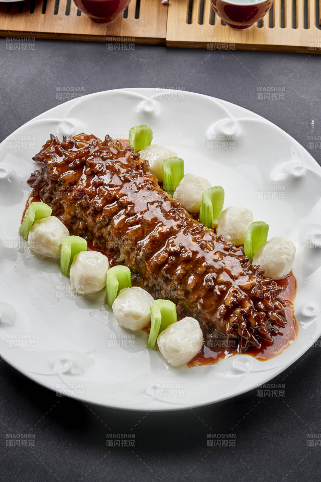 红烧寿桃梅花参配手打墨鱼丸图片