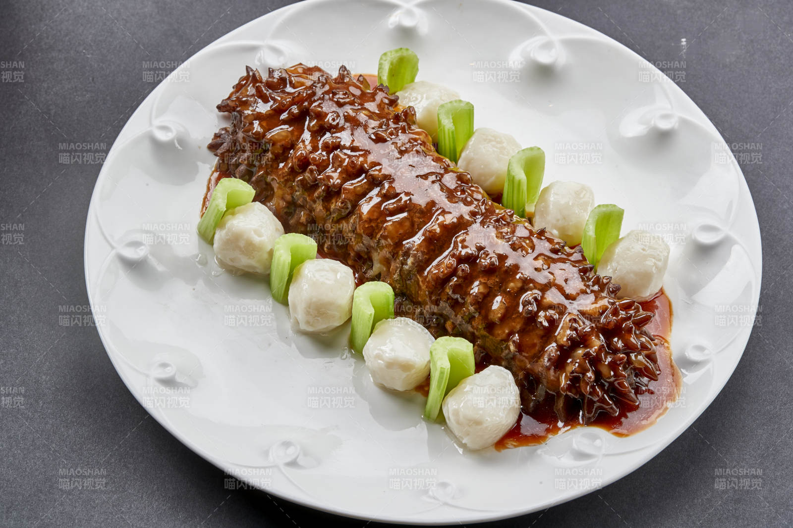 红烧寿桃梅花参配手打墨鱼丸图片