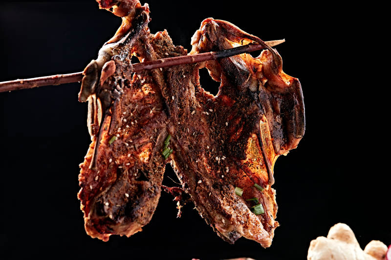 炭烤秘制鸡架图片