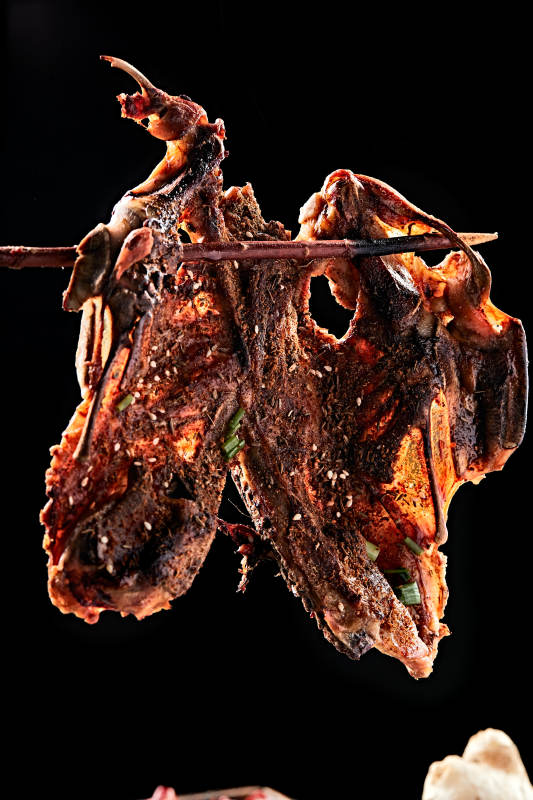 炭烤秘制鸡架图片
