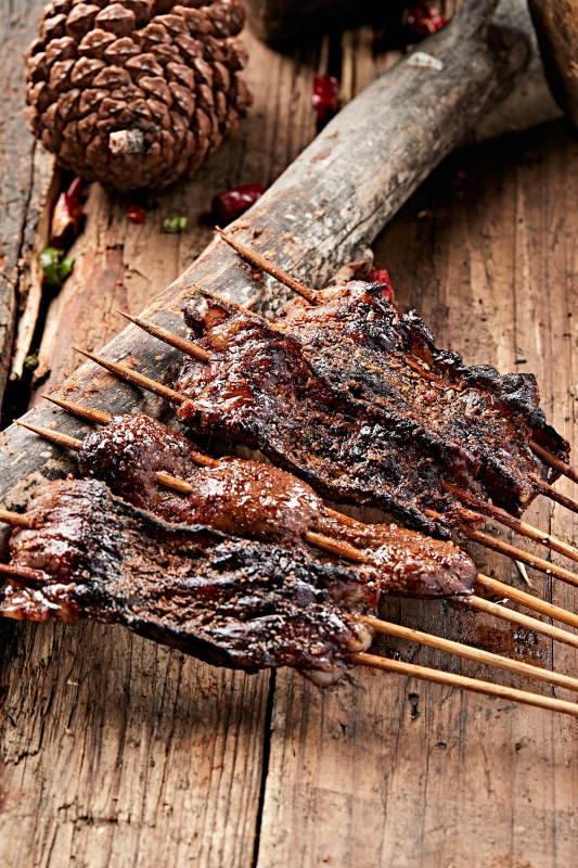 炭烤裹油羊肝片图片