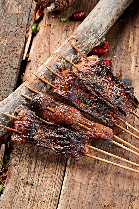 炭烤裹油羊肝片图片