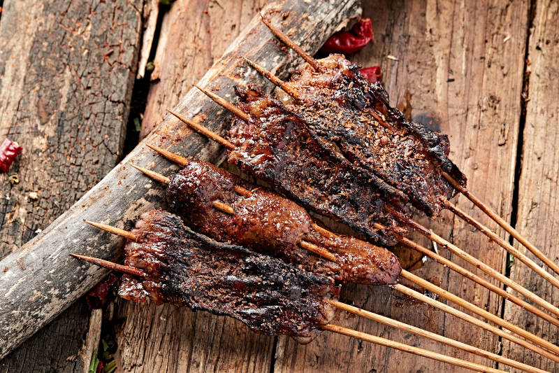 炭烤裹油羊肝片图片