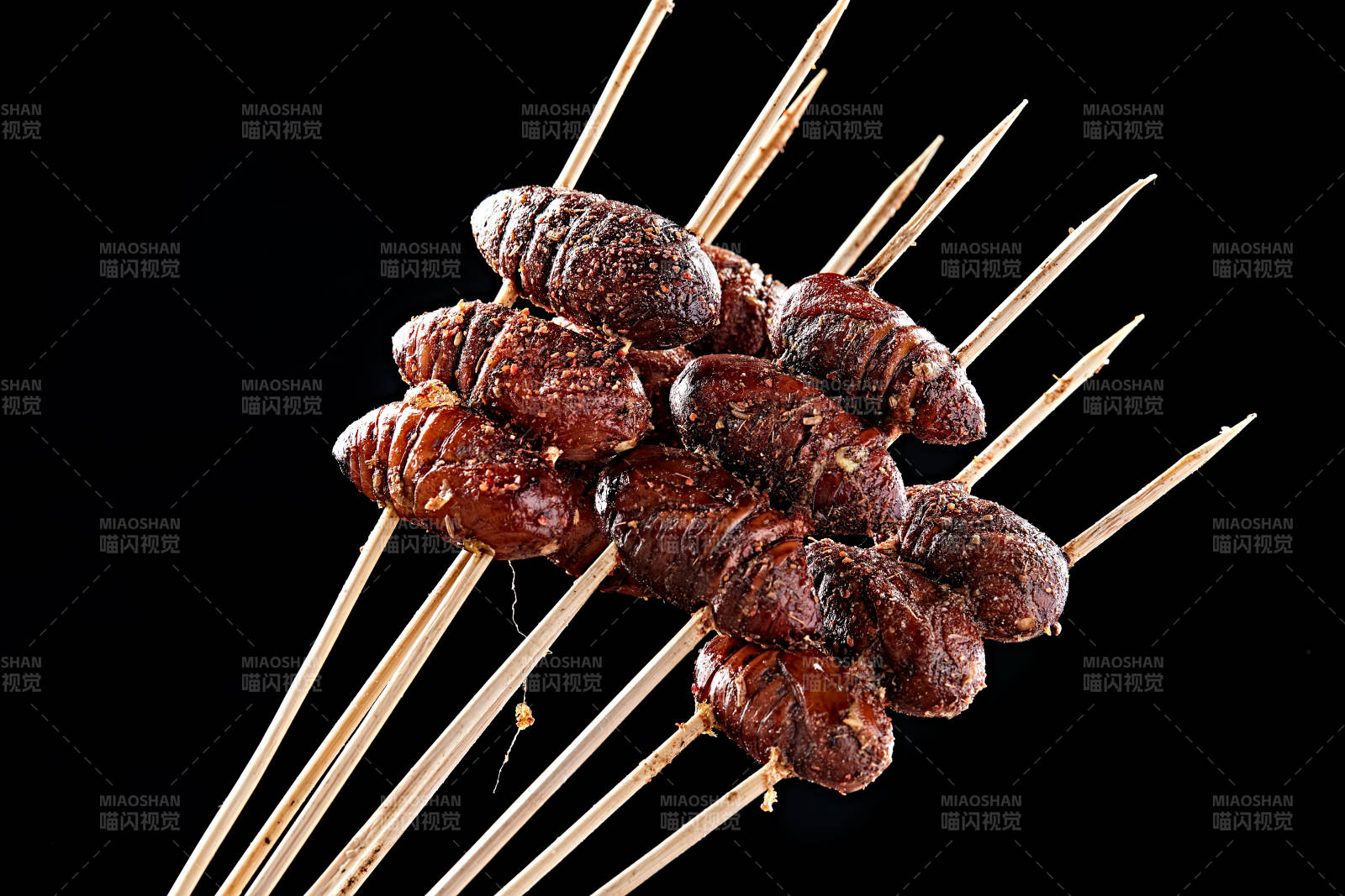 风味炭烤蚕蛹图片