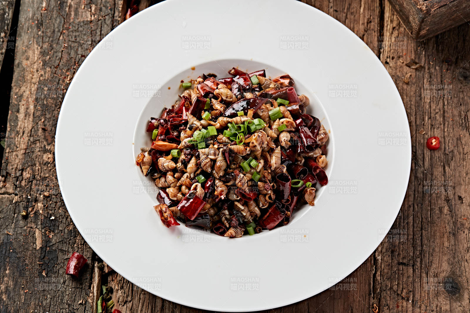 川味麻辣小海螺图片