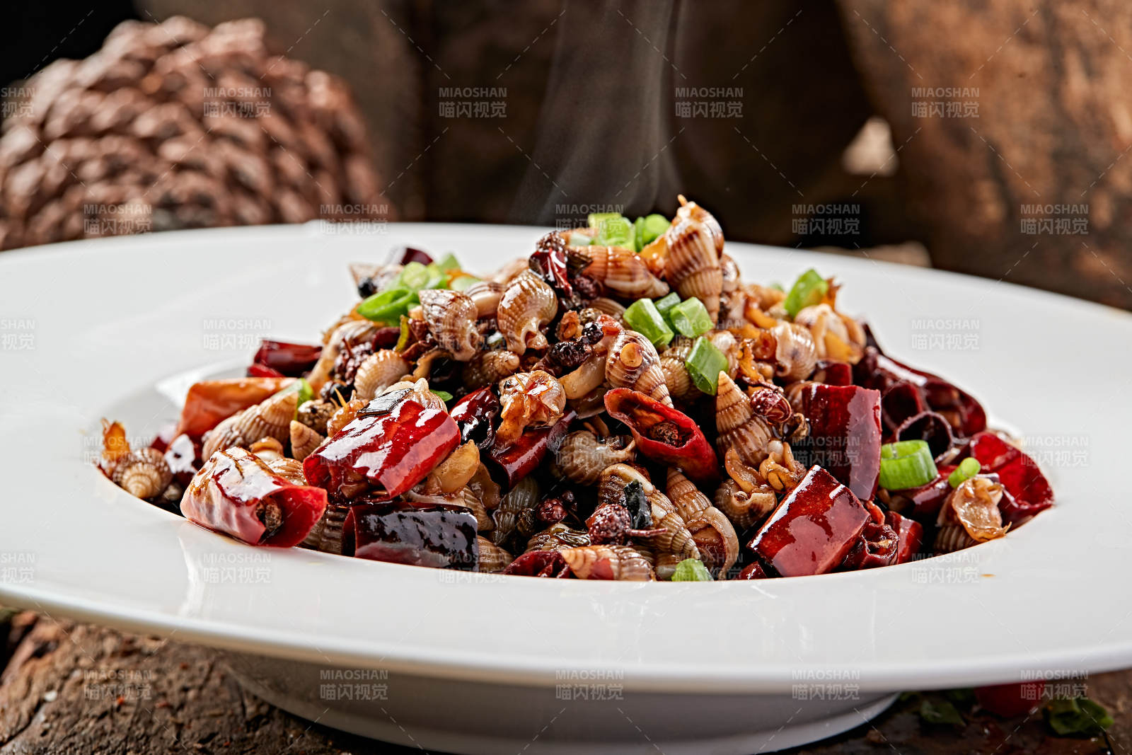 川味麻辣小海螺图片