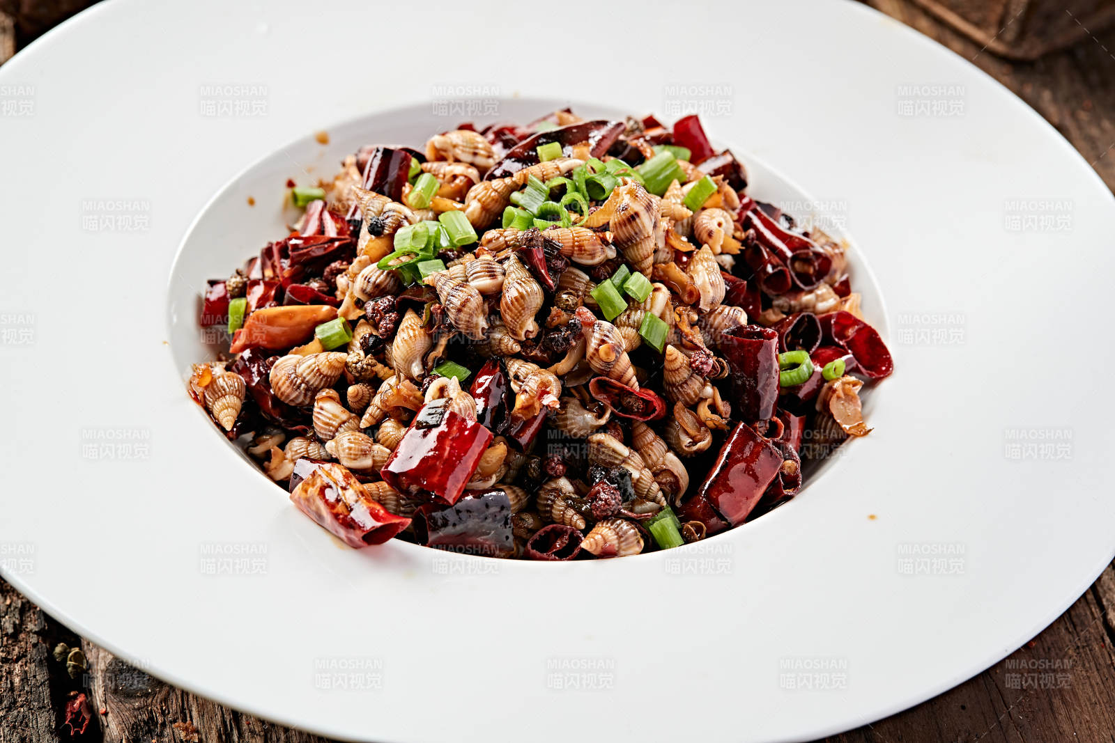 川味麻辣小海螺图片