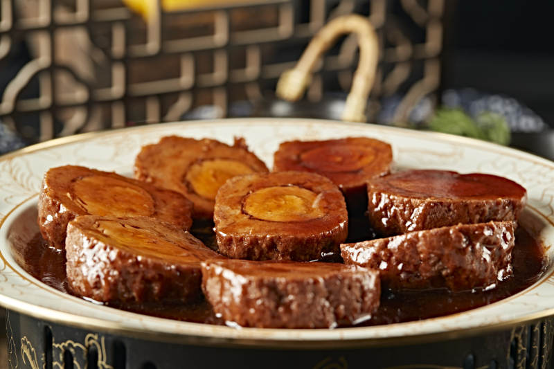 浇汁红烧凤眼丸子图片