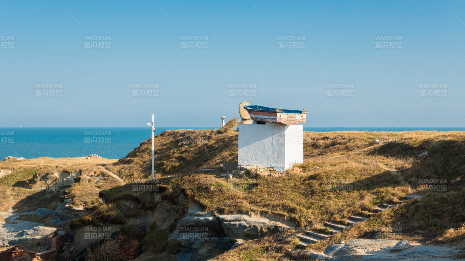 泉州海边孤屋静谧景图片
