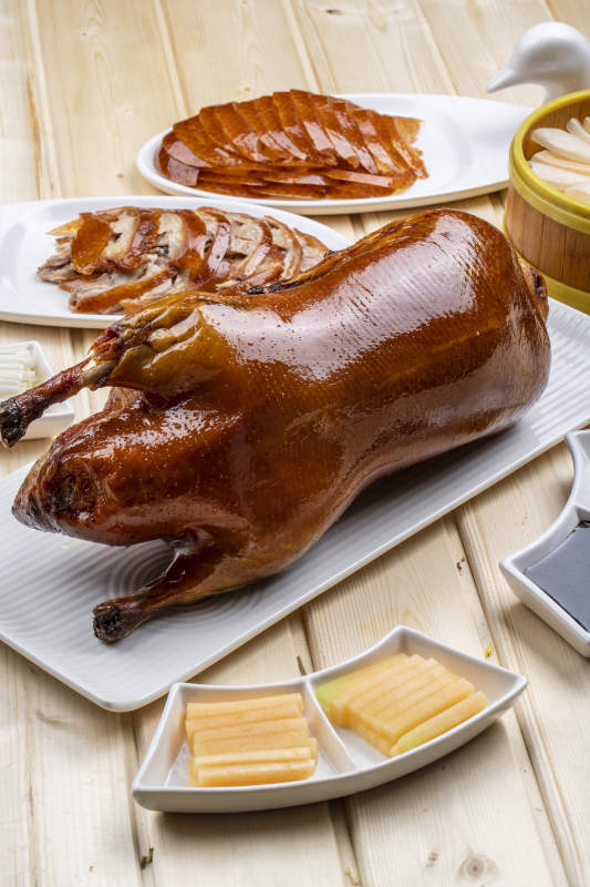 桑拿木质板上的北京烤鸭图片