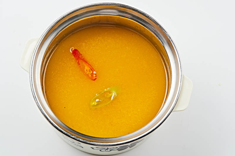 泰式酸汤火锅锅底底料图片