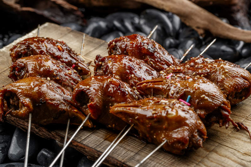 锦州烧烤秘制烤鸡头图片