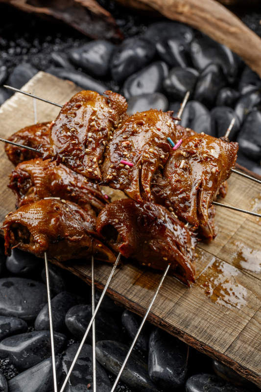 锦州烧烤秘制烤鸡头图片