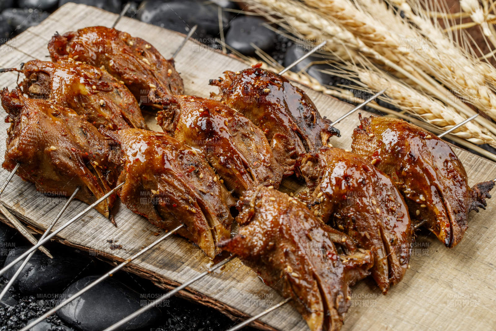 锦州烧烤秘制碳烤鸡头图片