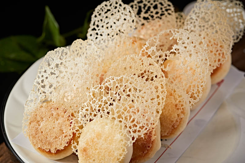 雪花渔网水煎包图片