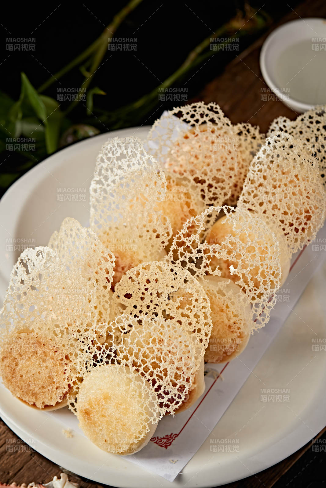 雪花渔网水煎包图片