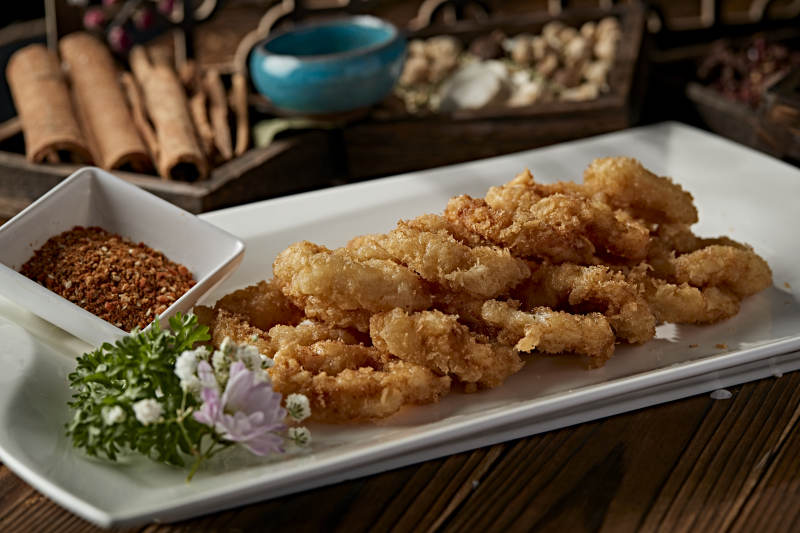 拖面油炸蘸粉鱿鱼圈图片