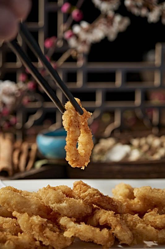 拖面油炸蘸粉鱿鱼圈图片