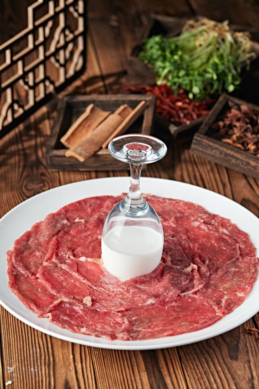 川渝火锅食材牛奶鲜牛肉图片