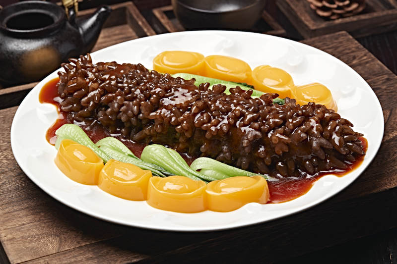 浇汁寿桃梅花参图片