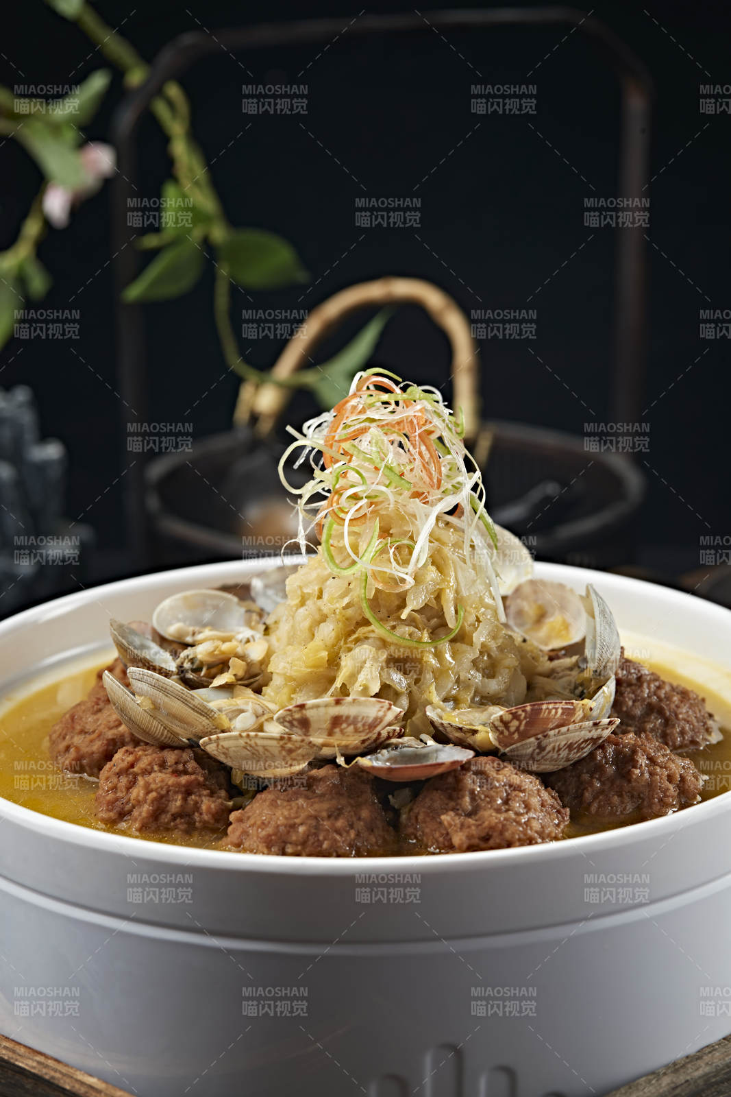 酸菜花甲炖猪肉丸子图片