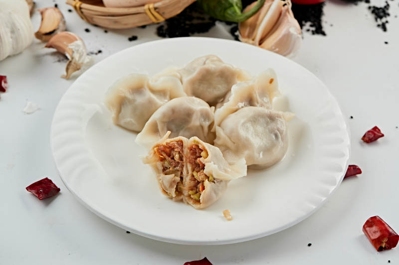 手工酱肉鲜豆角馅饺子图片