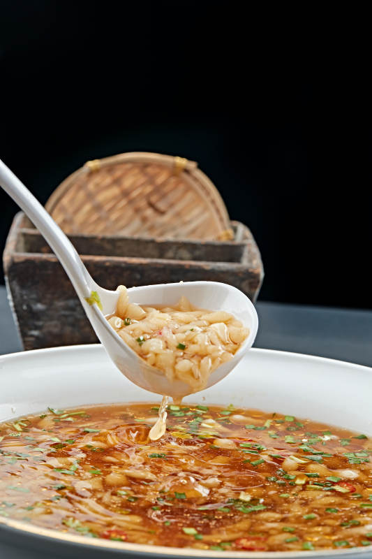 酸汤菜丝蒜香面蝌蚪图片