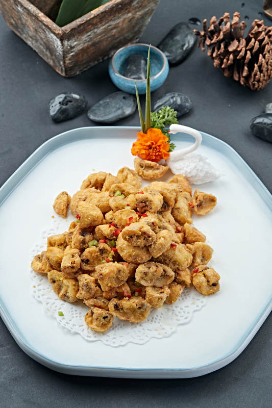 咸蛋黄焗塞外白口蘑图片