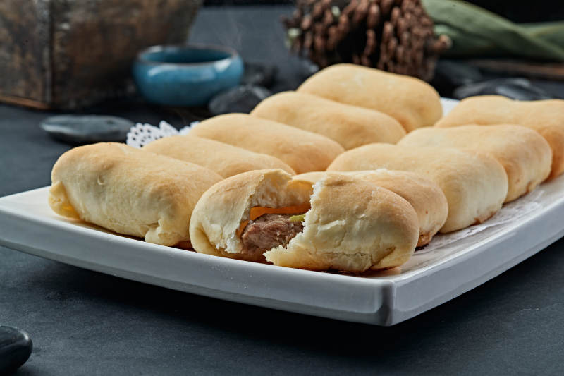 新疆馕坑烤包子图片