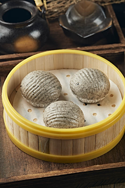 港式茶餐香蒸黑芝麻流沙包图片