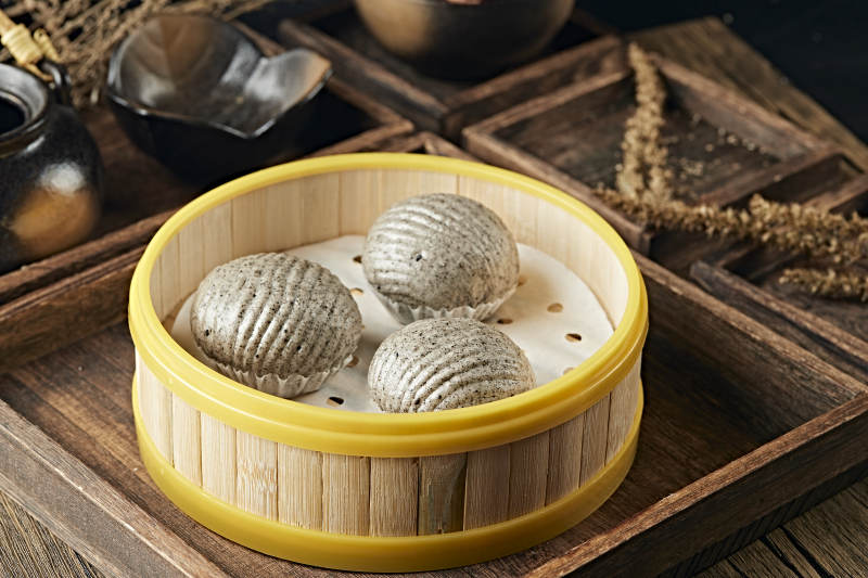 港式茶餐香蒸黑芝麻流沙包图片