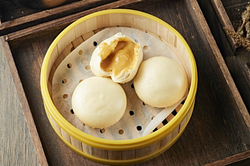 港式茶餐黄金流沙包图片