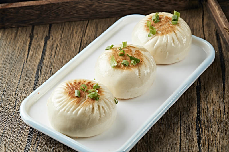 港式茶餐生煎包图片