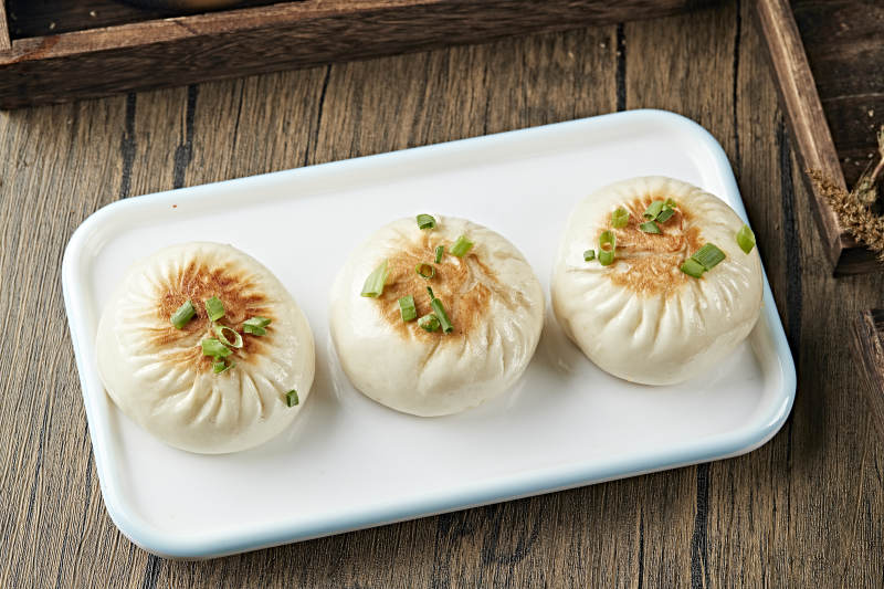 港式茶餐生煎包图片