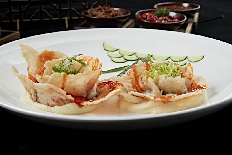 牡丹花造型的茄汁炸熘鱼片图片