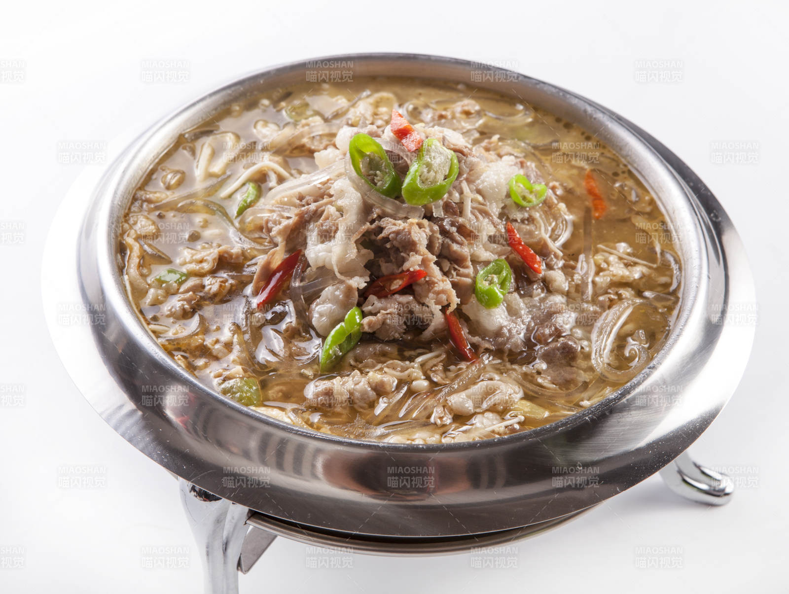 不锈钢餐具装的酸汤羊肉图片