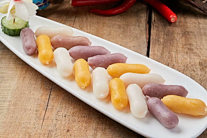 火锅食材彩色韩式年糕条图片