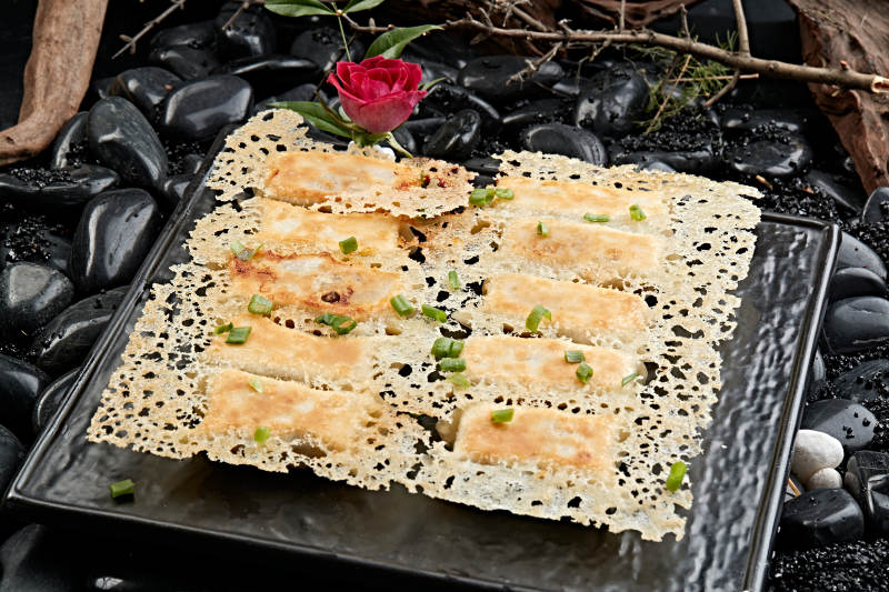 王将渔网水煎饺子图片