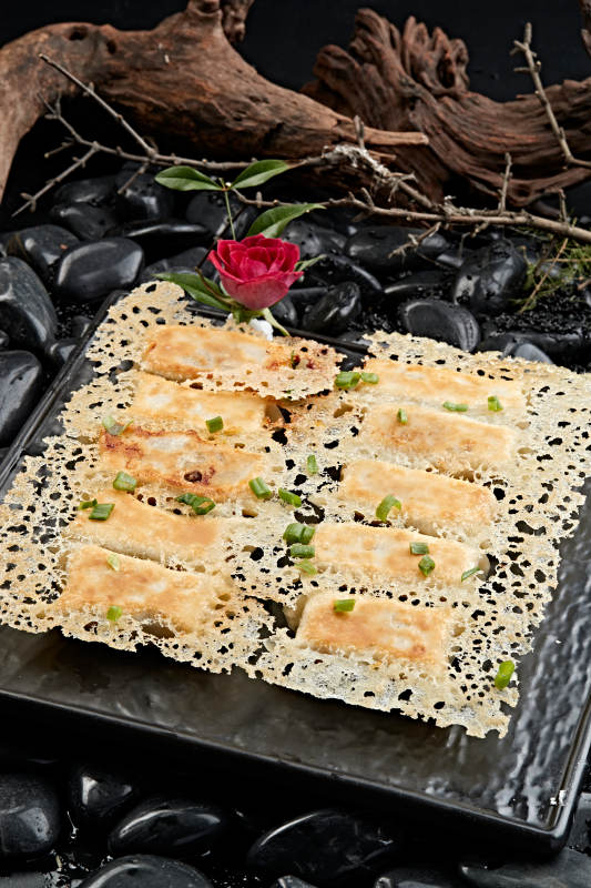 王将渔网水煎饺子图片