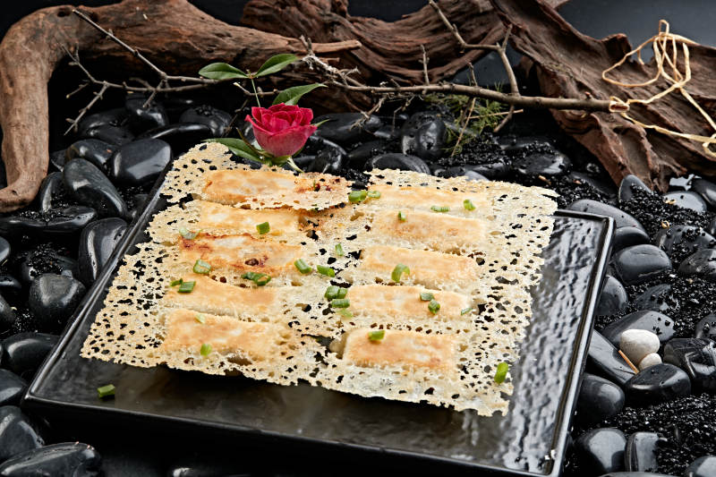 王将渔网水煎饺子图片