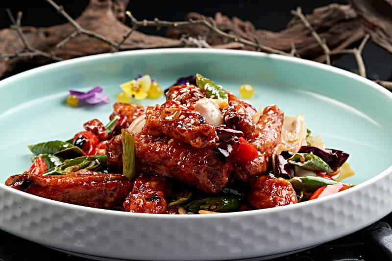 川香油炸麻辣鸡翅中图片