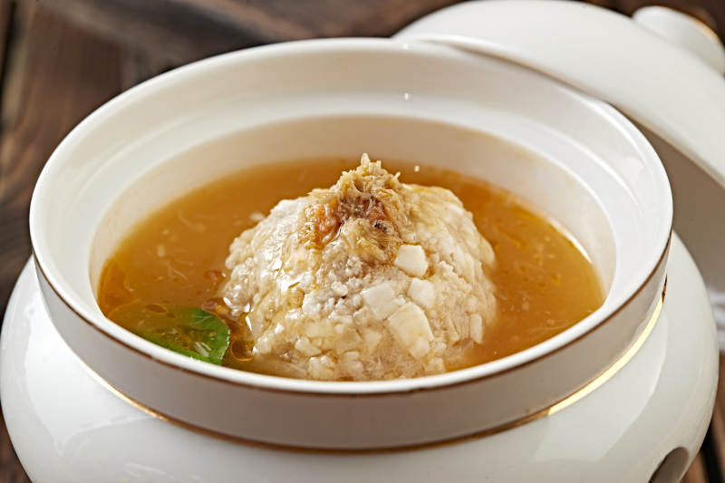 位菜浓鸡汤炖葵花大斩肉狮子头图片