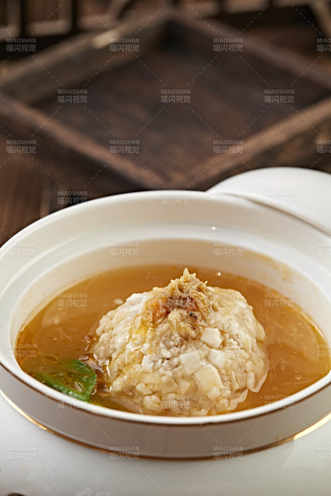 位菜浓鸡汤炖葵花大斩肉狮子头图片