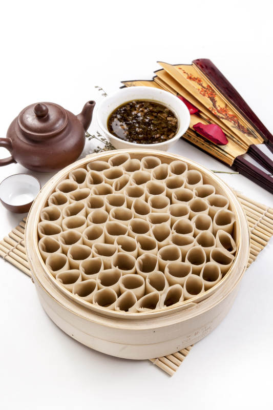 竹蒸笼与茶具静物图片