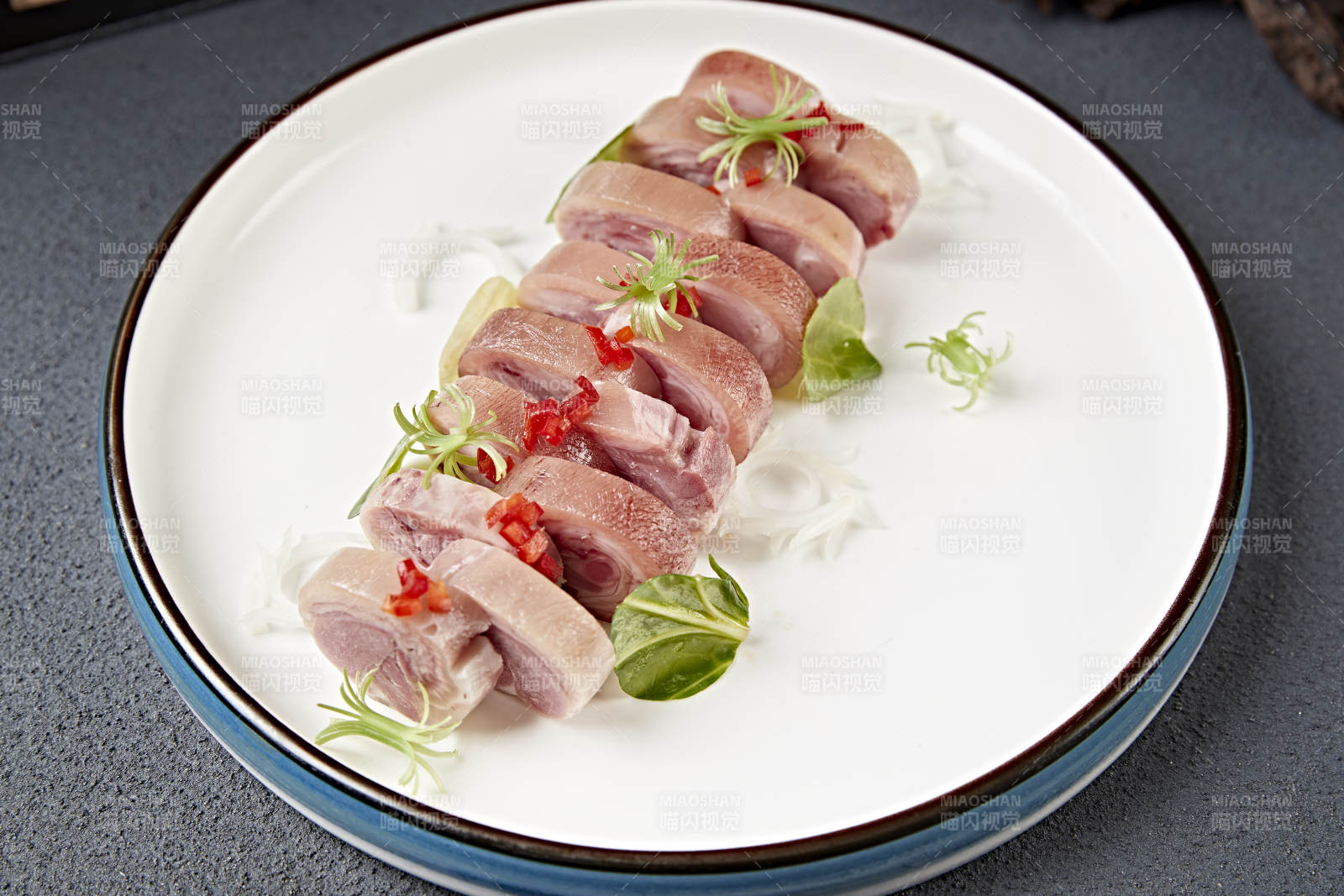 卤味压猪肘花卷切片图片